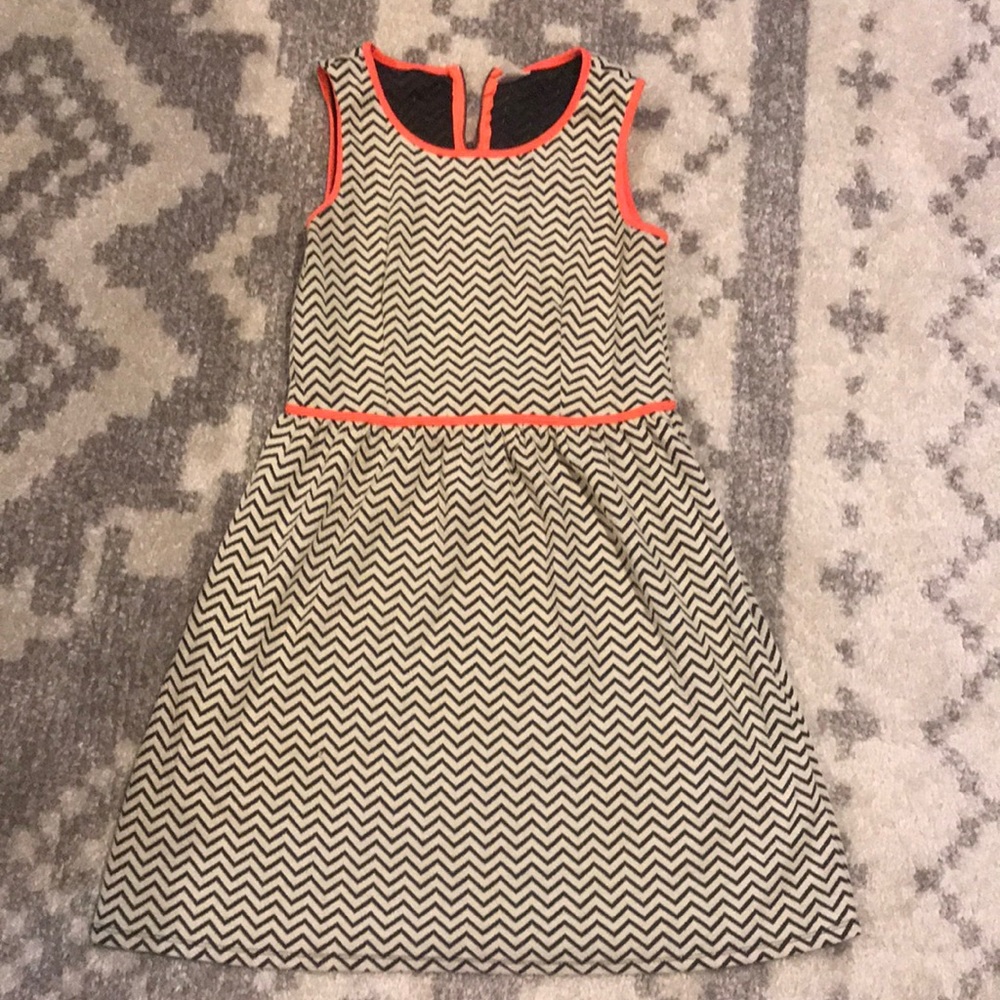 Chevron pattern dress with pink piping